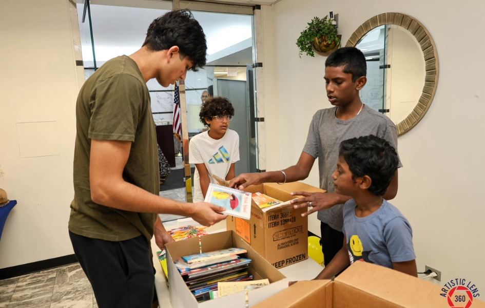 Students sharing donated books